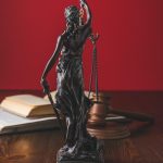 opened-juridical-books-with-lady-justice-statue-on-wooden-table-law-concept-rrk3hdmibwo4q3fc5nphy6jt2c3gd678joowwg6how